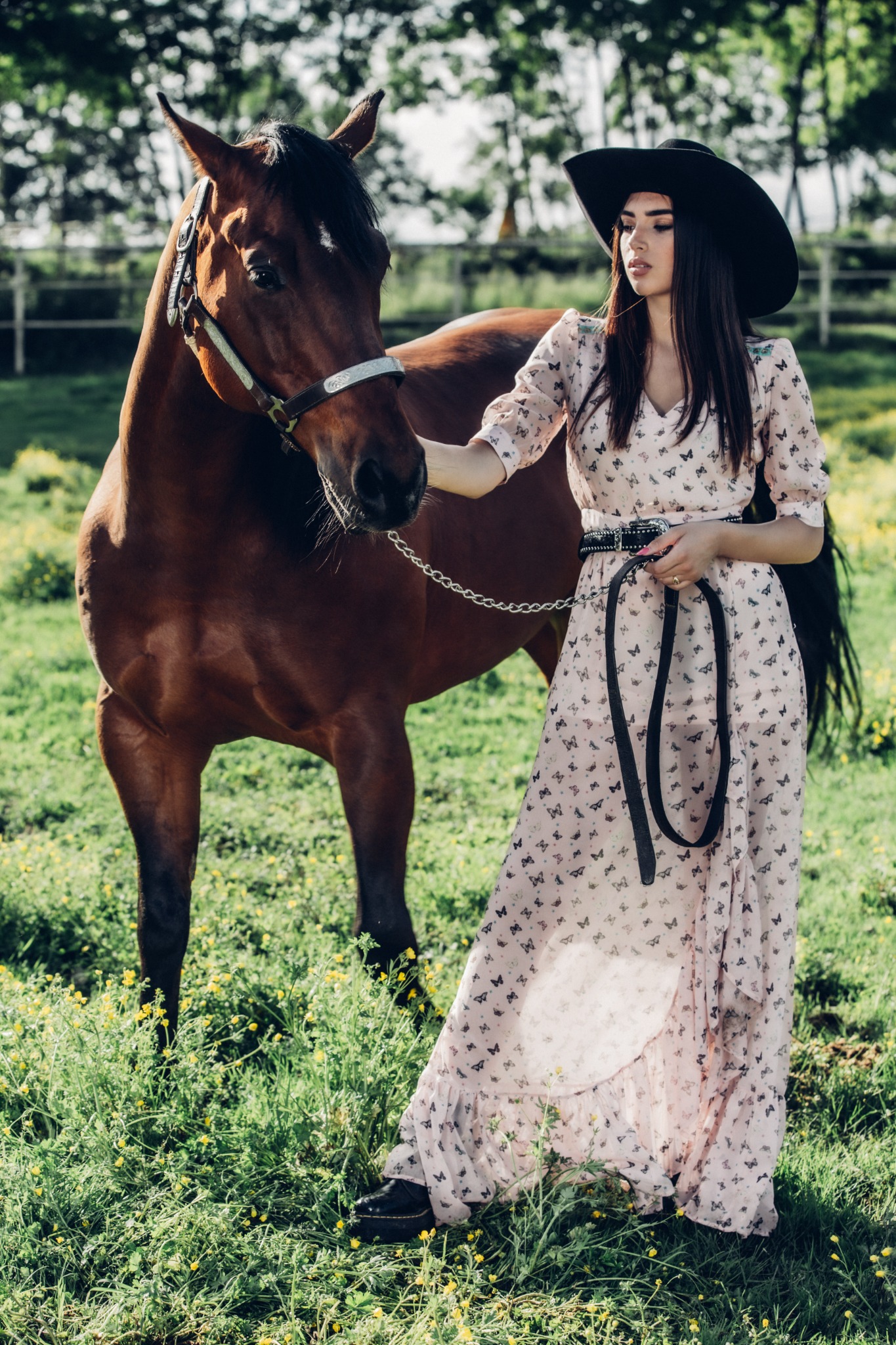 Western portrait with horse in a field