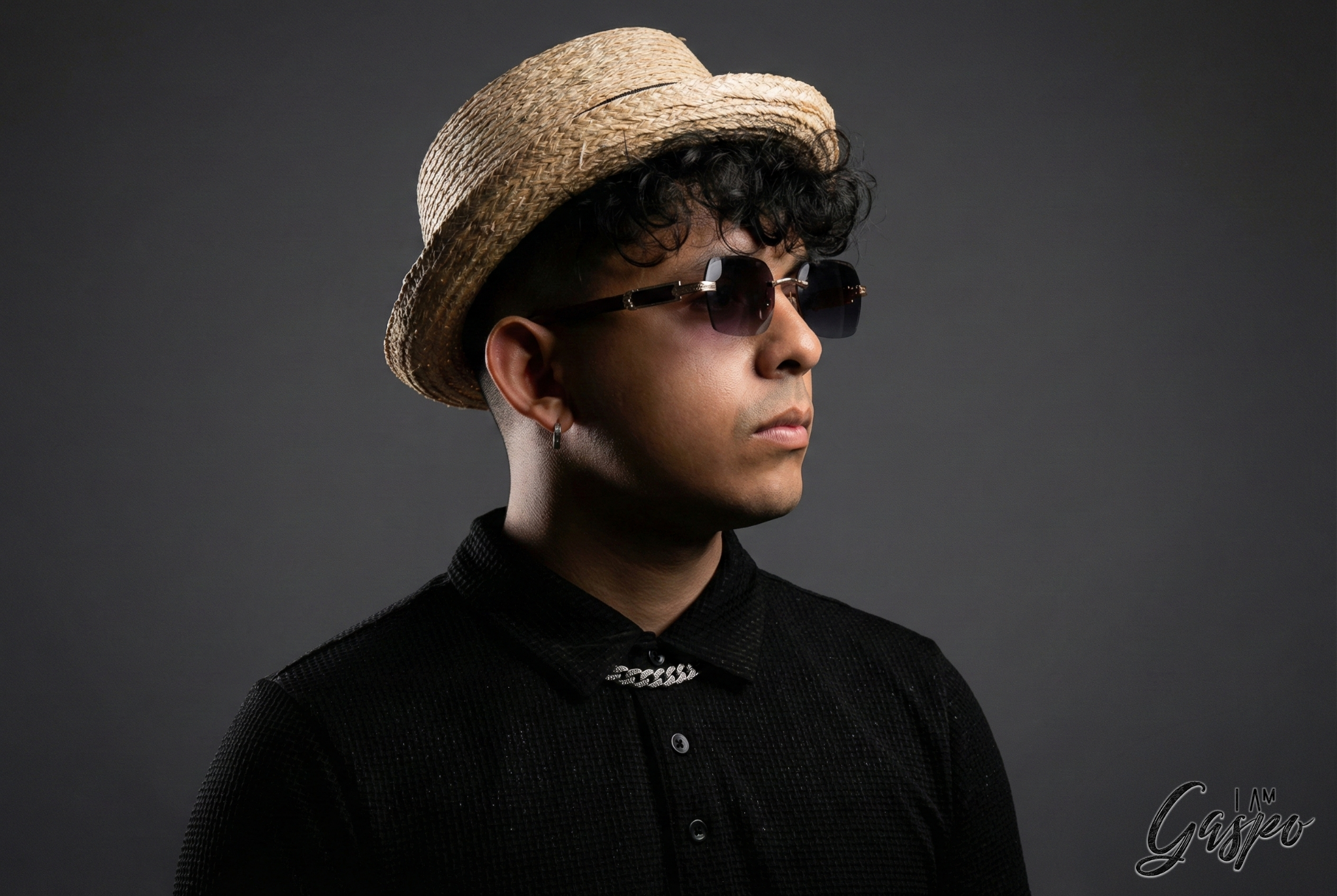 Studio portrait with hat and sunglasses